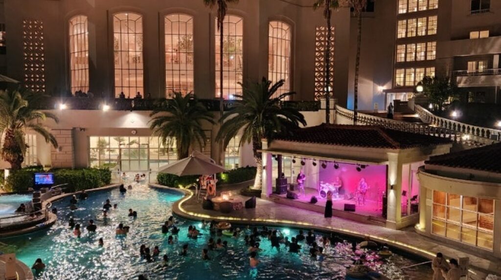 The Shilla Jeju outdoor pool at night with live band performance