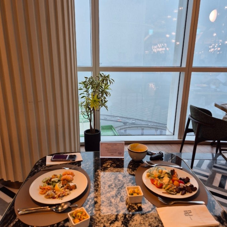 Hotel Naru Seoul M Gallery exterior with Han River frontage in Mapo