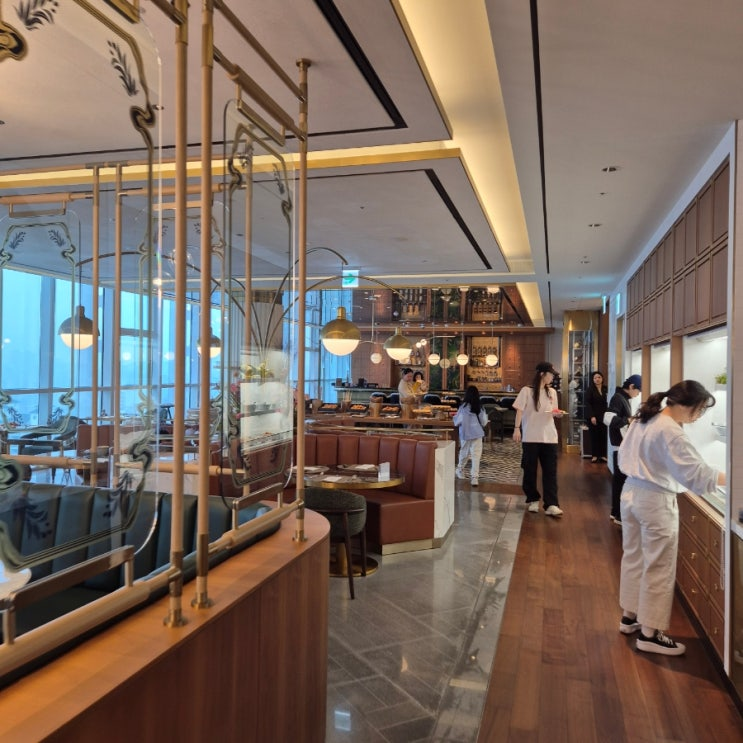 Hotel Naru Seoul M Gallery interior corridor with gold and marble finishes