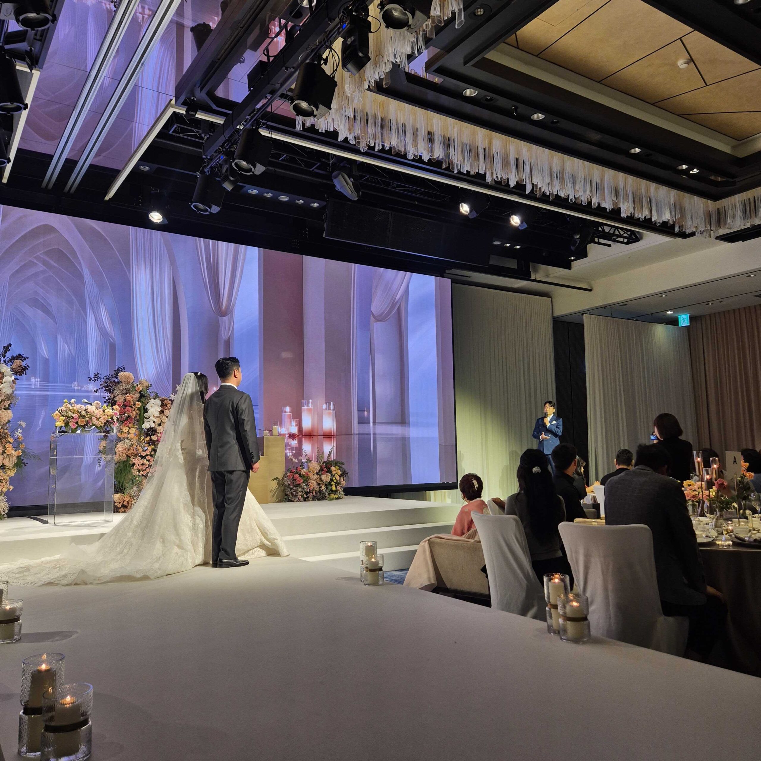 Korean hotel wedding ceremony with bride and groom standing at altar Seoul