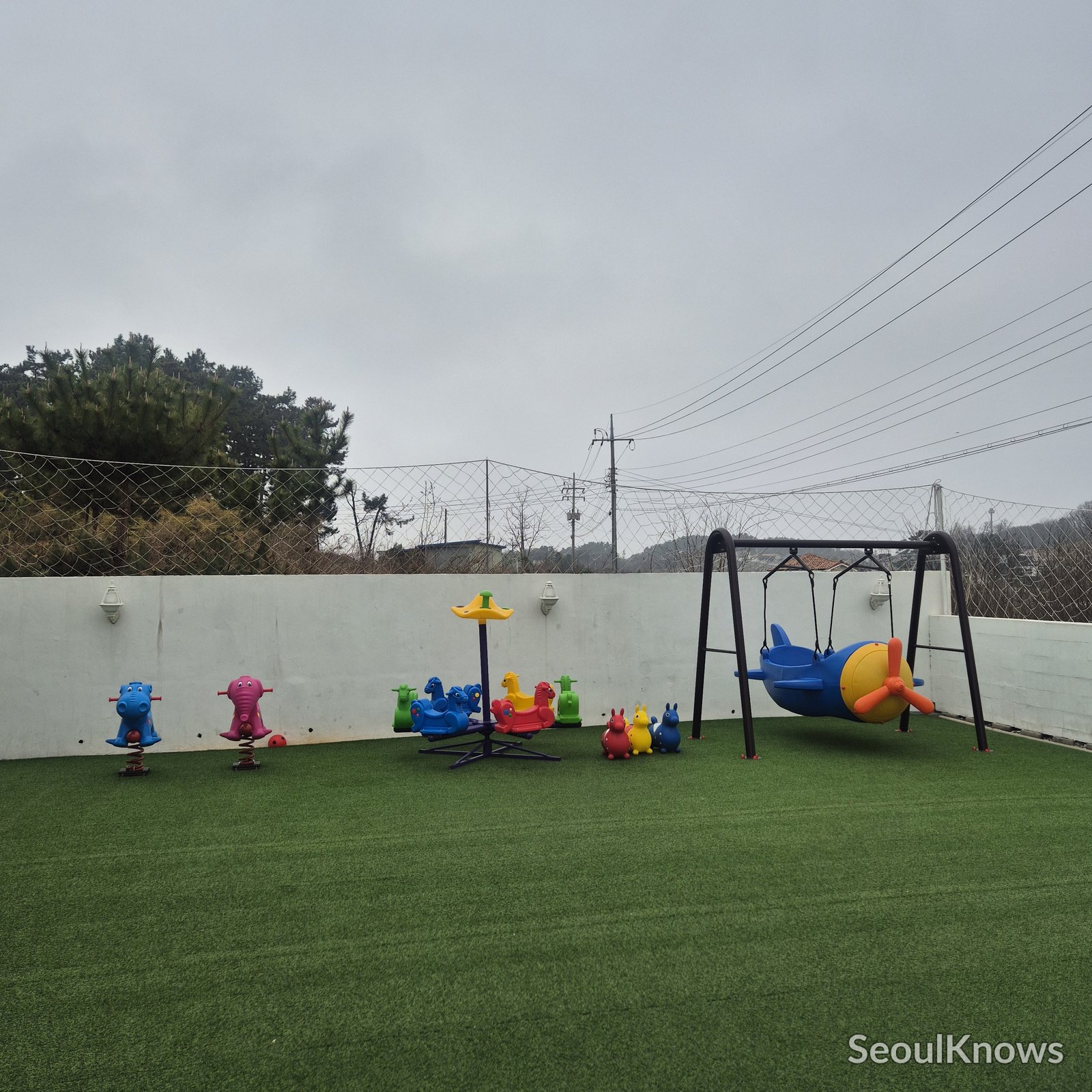 HAY grassy yard play area