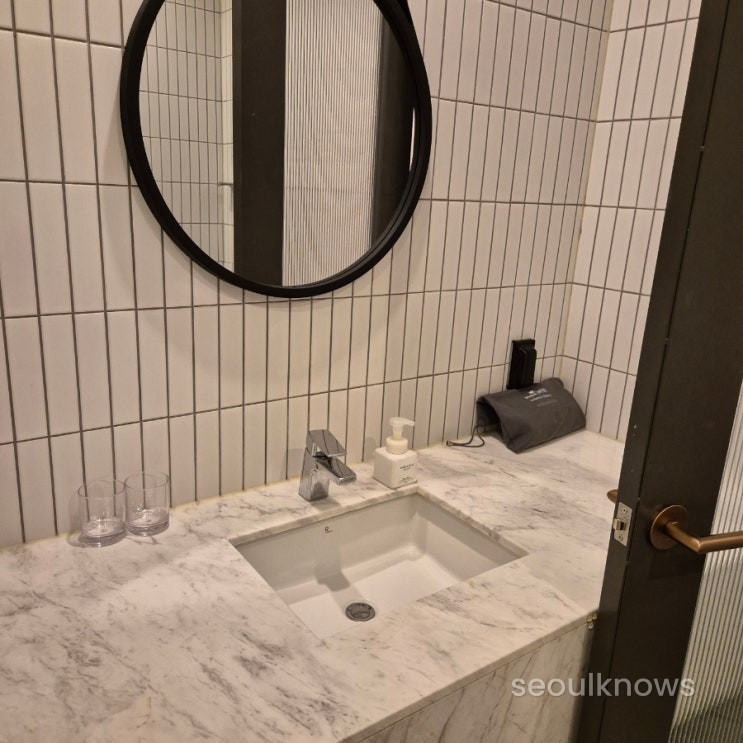 Modern tiled bathroom basin at Hound Garden & Terrace