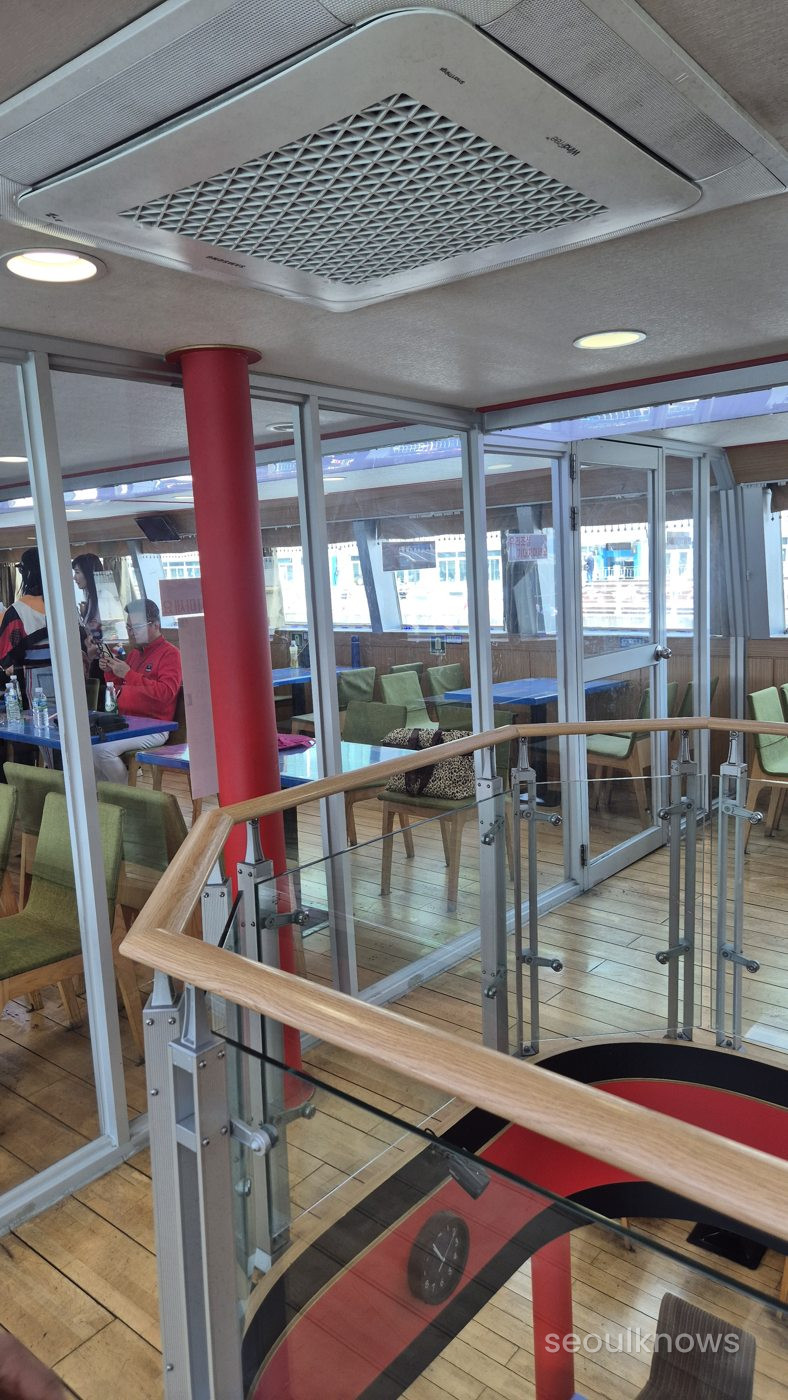 Stairwell and red interior of the Jagalchi Cruise
