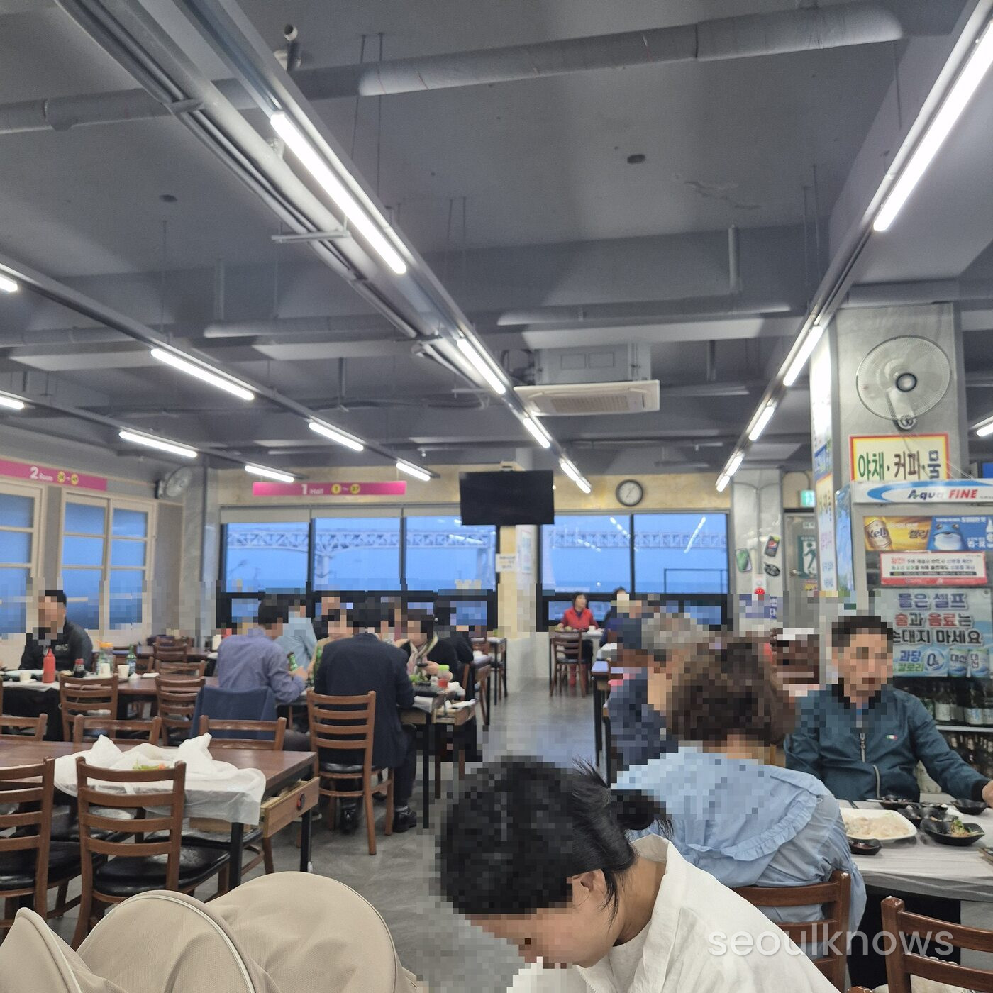 The spacious second-floor dining hall at Millak Live Fish Market