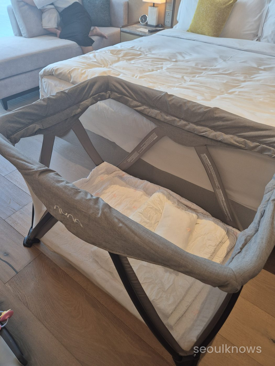Baby crib set up in a Wyndham Grand Busan room