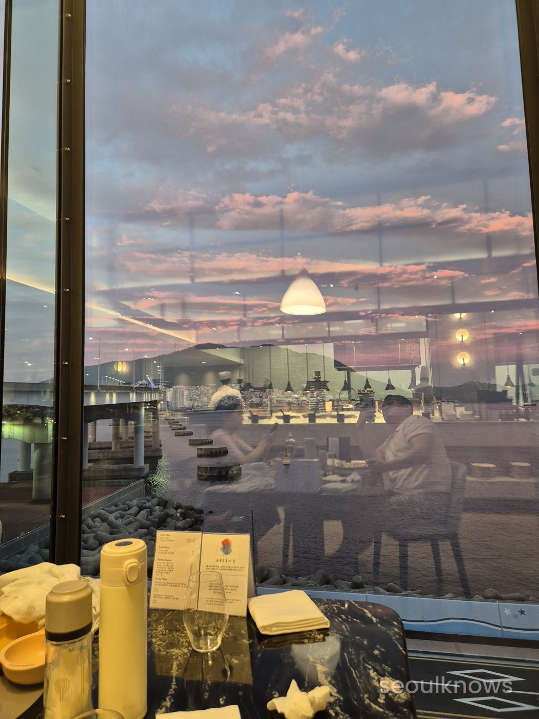 Sunset over the sea from the Wyndham Grand Busan buffet window
