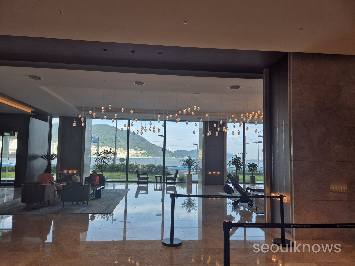 Wyndham Grand Busan lobby entrance with ocean view