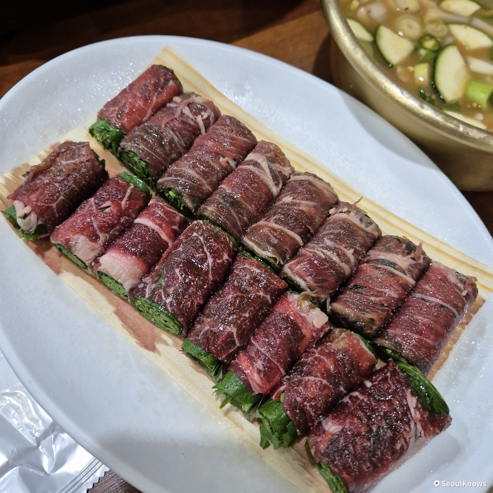 Raw beef and chive rolls (gogi-mari) at Asura Gijang