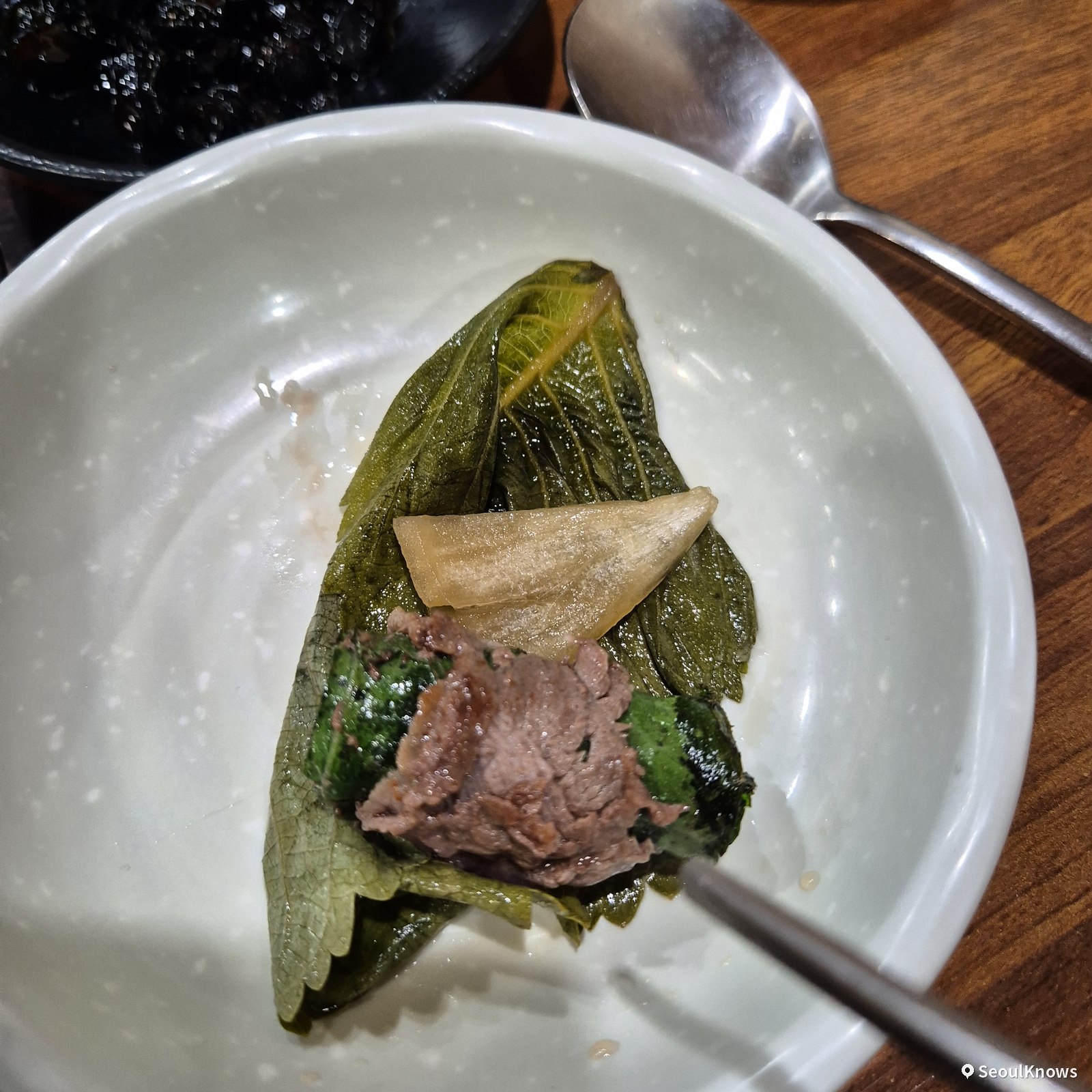 Grilled beef roll wrapped in a perilla leaf at Asura Busan