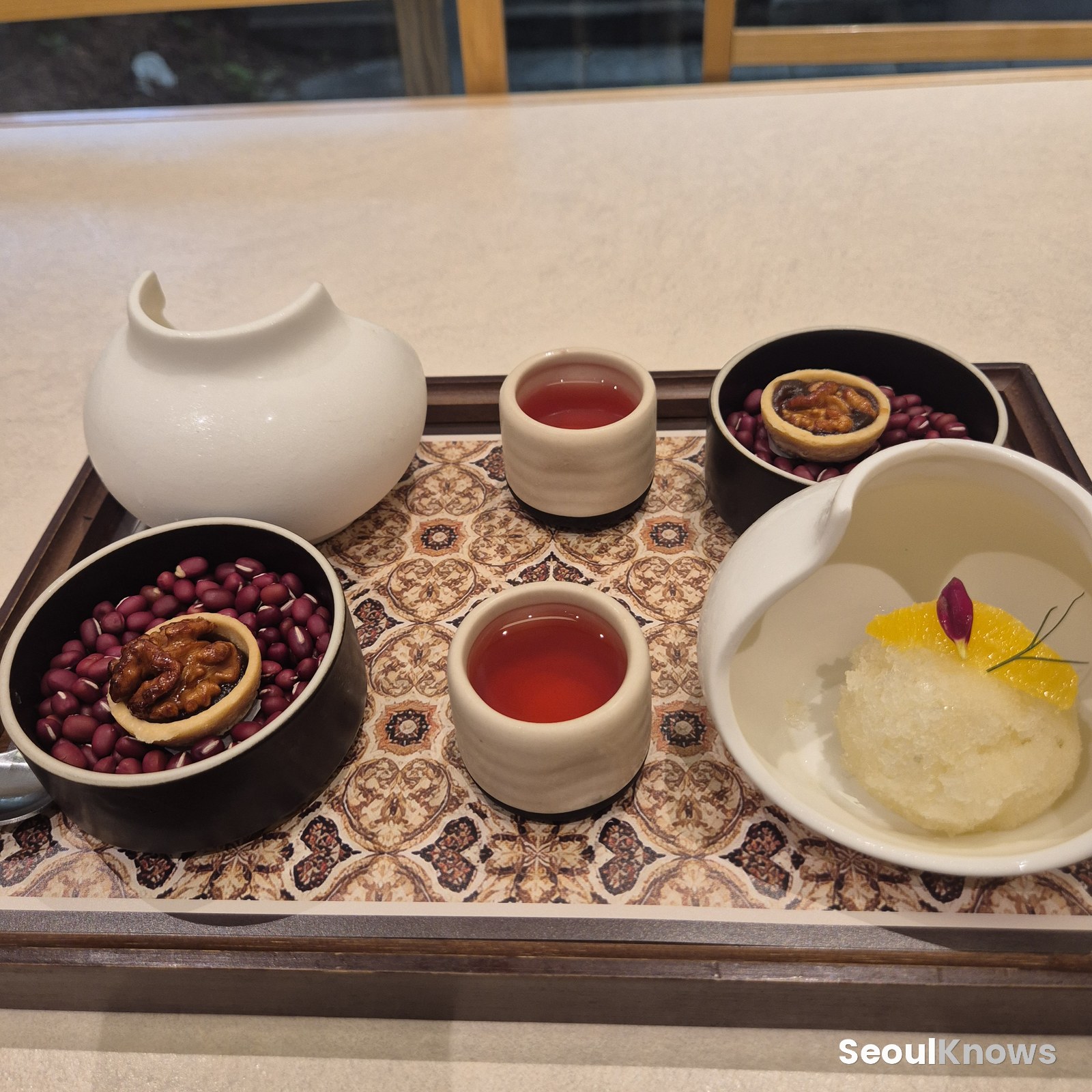 Dessert of sherbet, candied walnut and omija tea