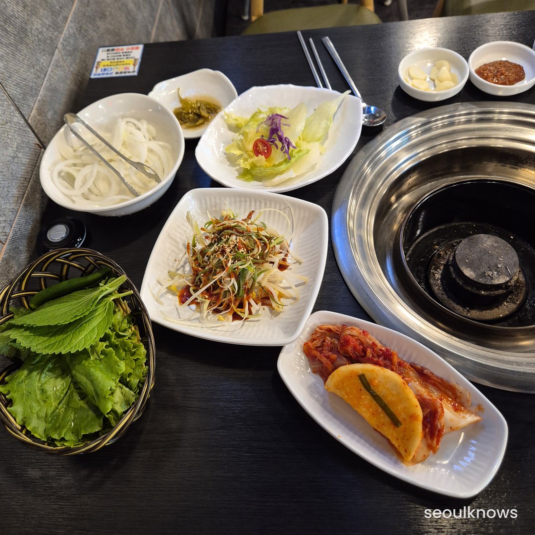 Lettuce, perilla, ssamjang and sides for Korean BBQ ssam wraps
