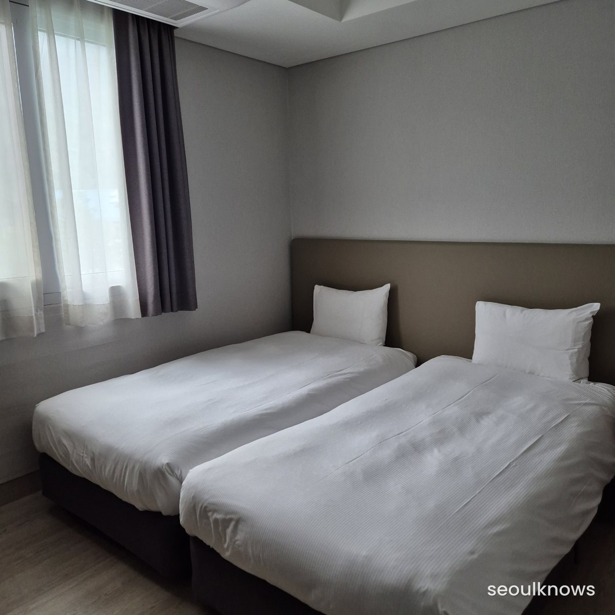 Twin beds in the Konjiam Resort condo