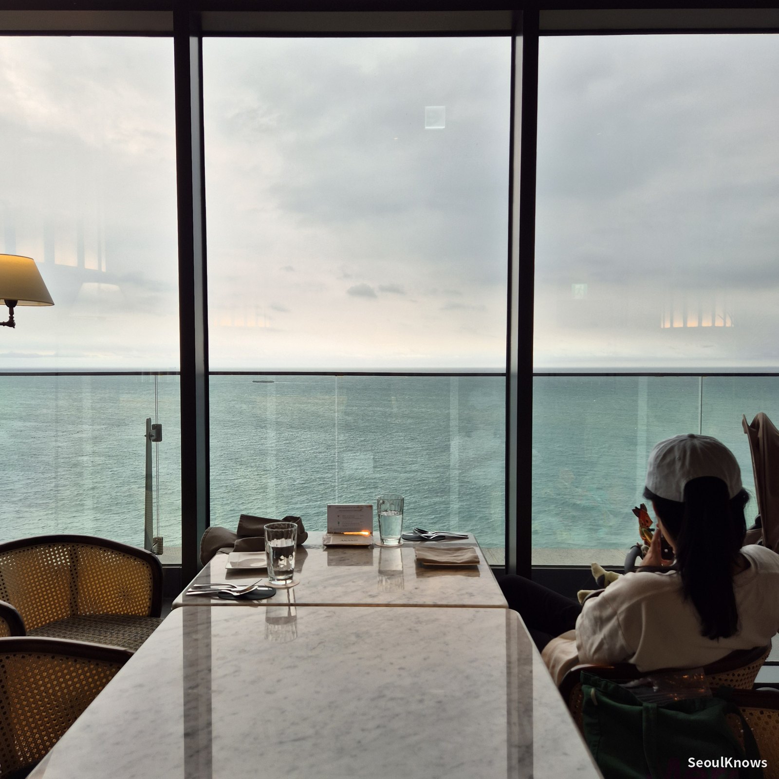 Ocean-view window seats at McQueens Grill and Bar