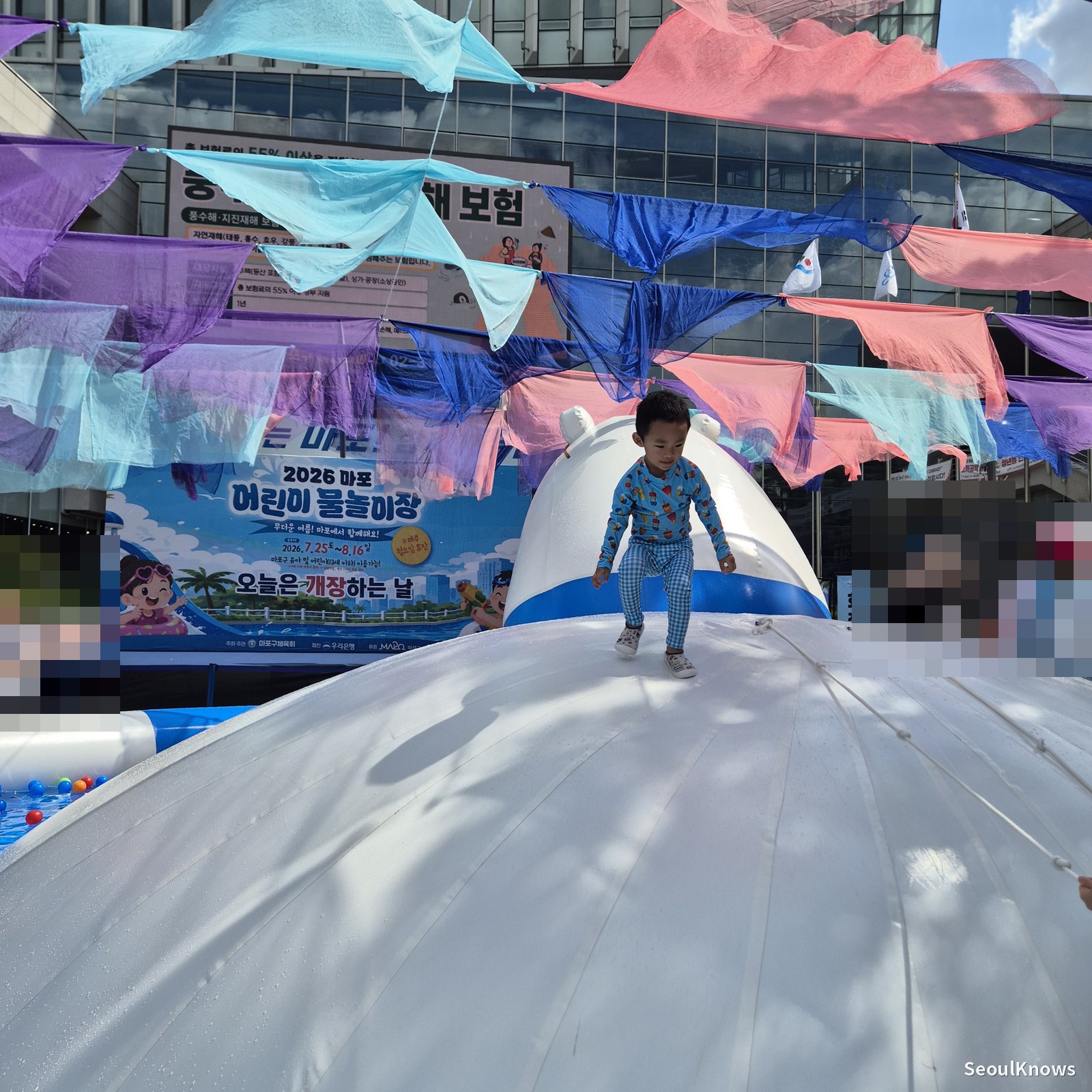 Kid on the polar-bear dome