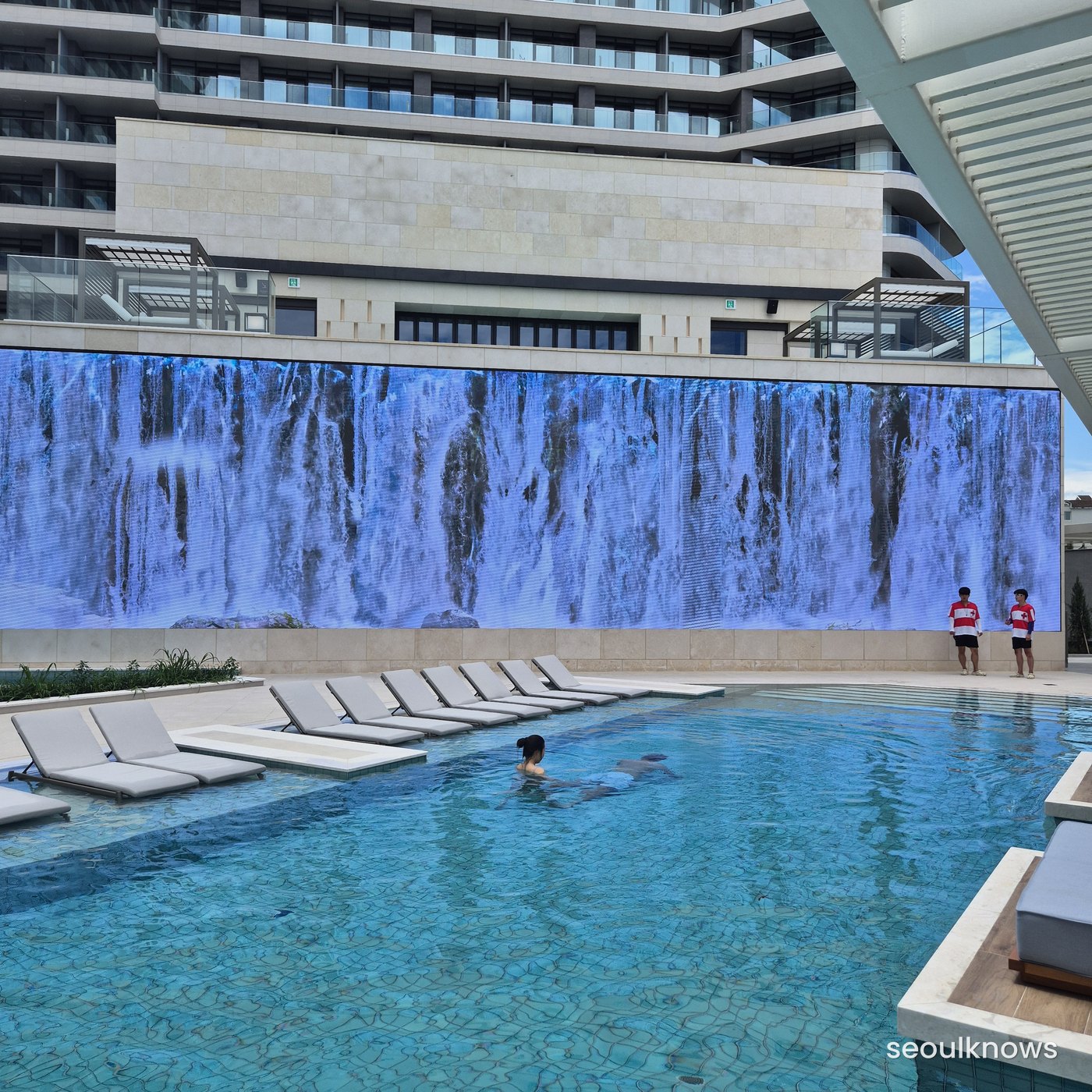 Pool with the LED waterfall screen