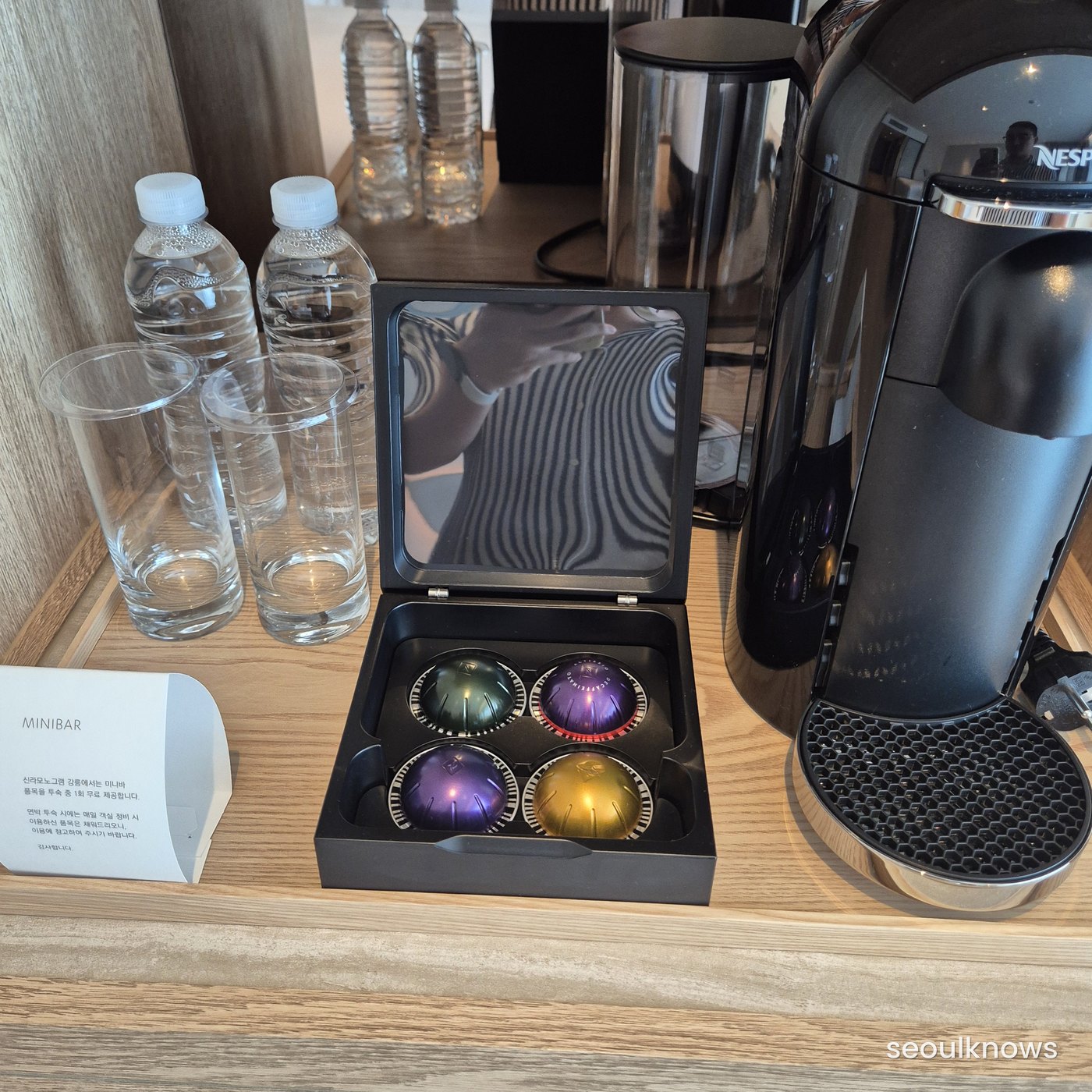 Complimentary minibar with Nespresso and water