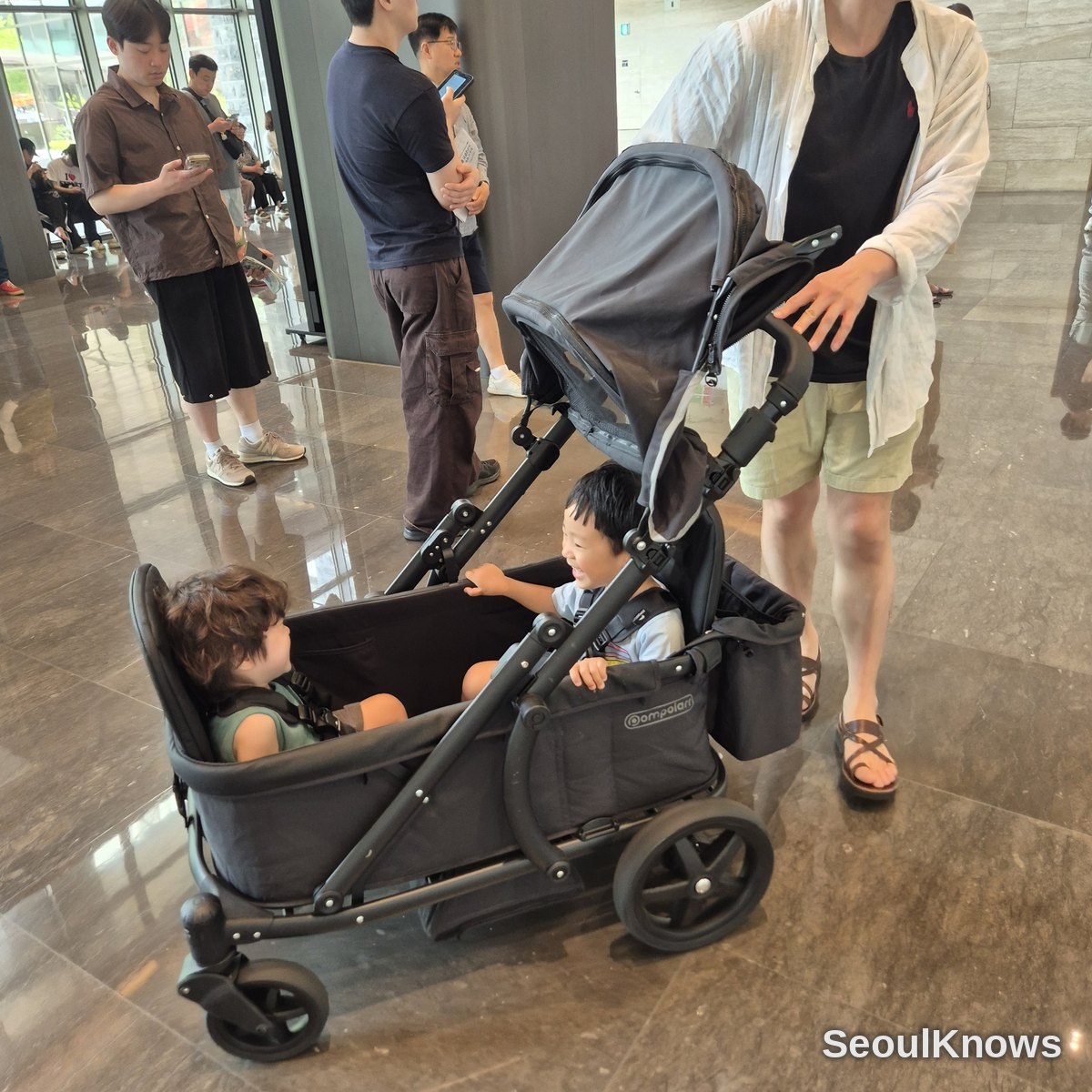 Kids riding a rental wagon at Resom Resort