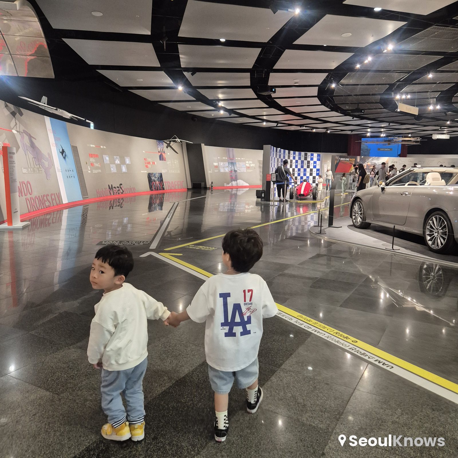First-floor exhibition hall at Samsung Fire Mobility Museum with kids