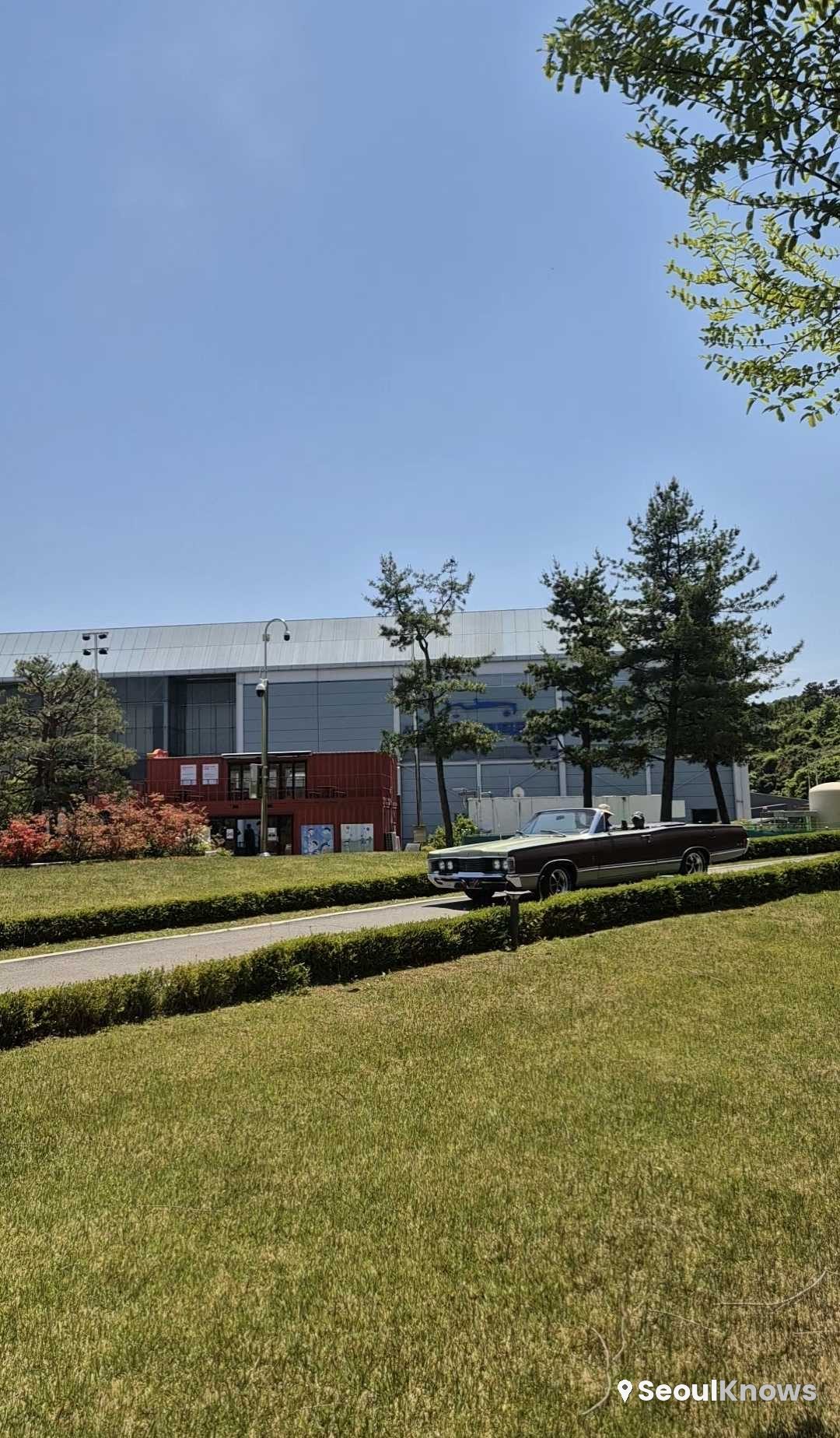 Outdoor classic-car view with building