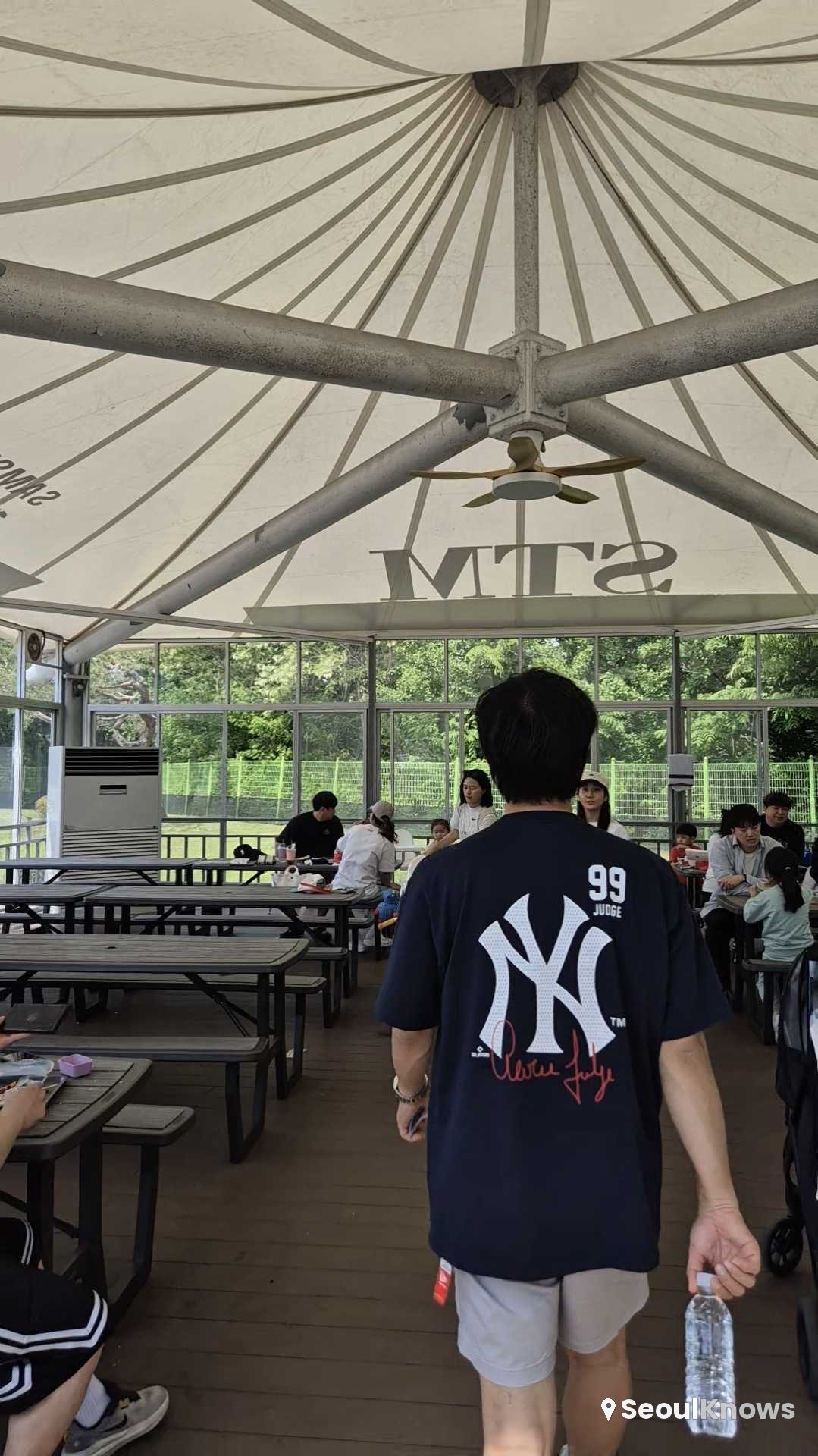 Picnic tables inside the outdoor rest area