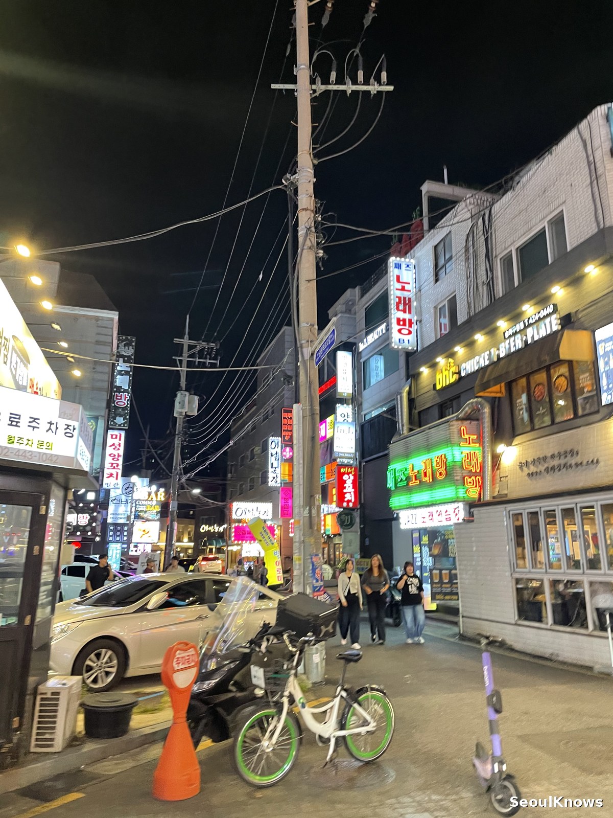 Typical Korean drinking street at night with neon signage