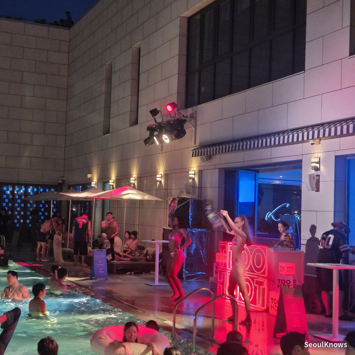 Performers on the poolside stage at Cimer Summer Festa