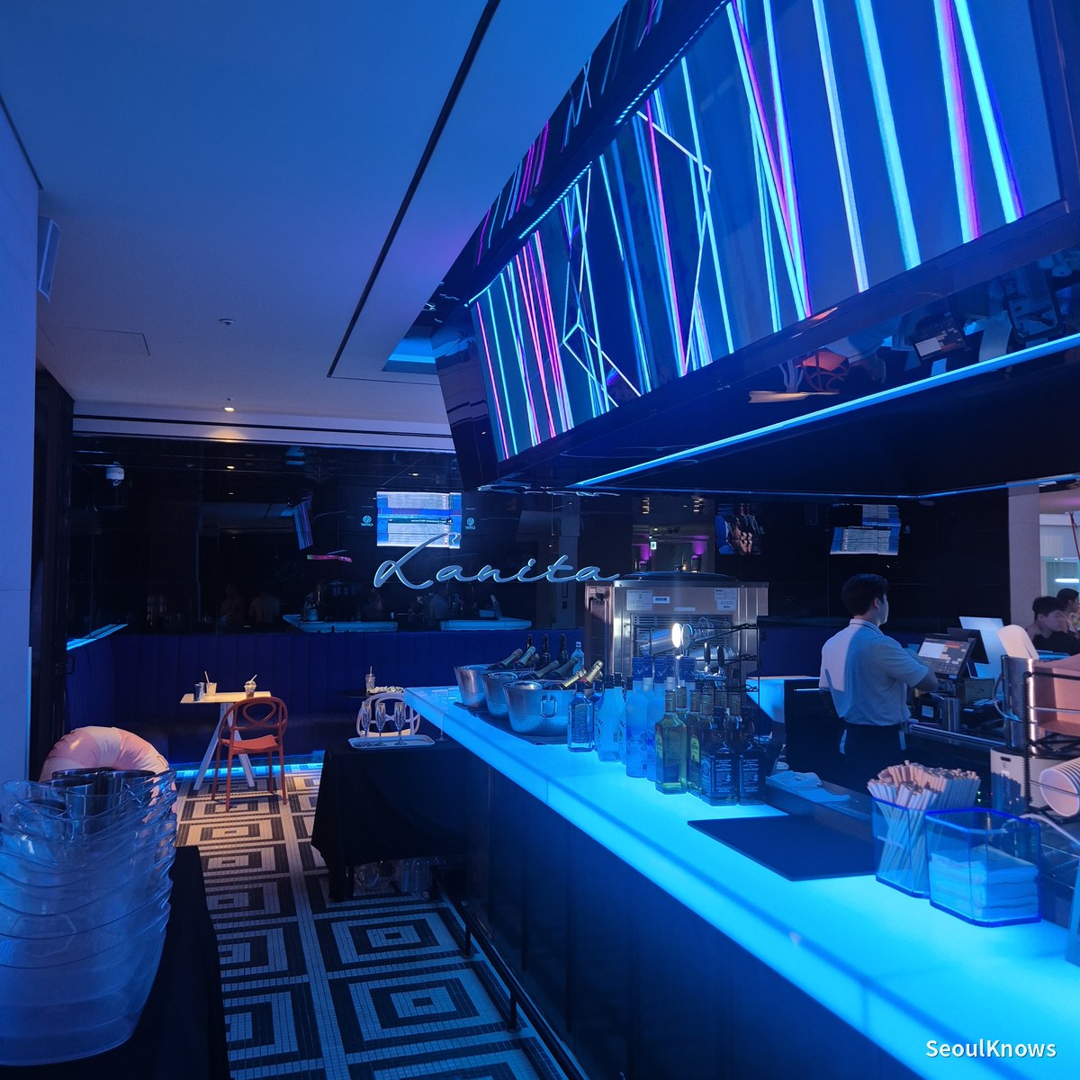 Sports Bar counter lit in blue inside the Cimer pool area
