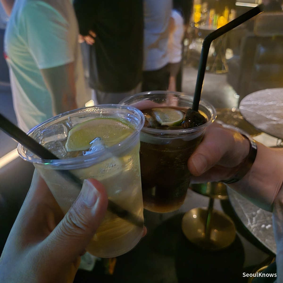Two cocktails toasted at Club Chroma