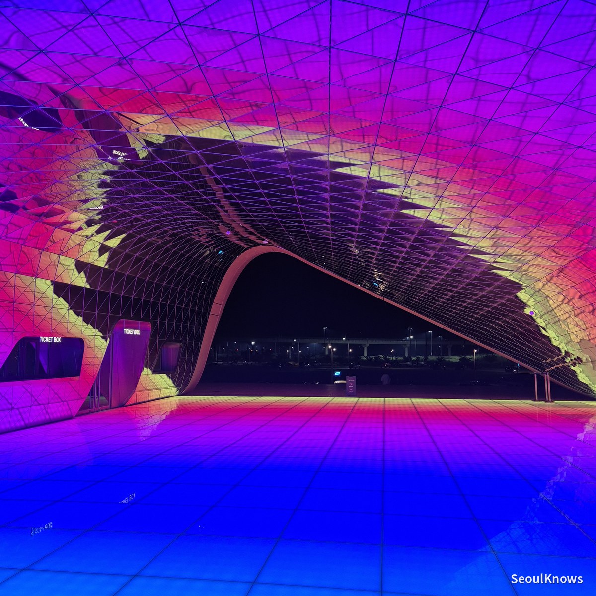 Illuminated outdoor art installation at Paradise City Incheon at night