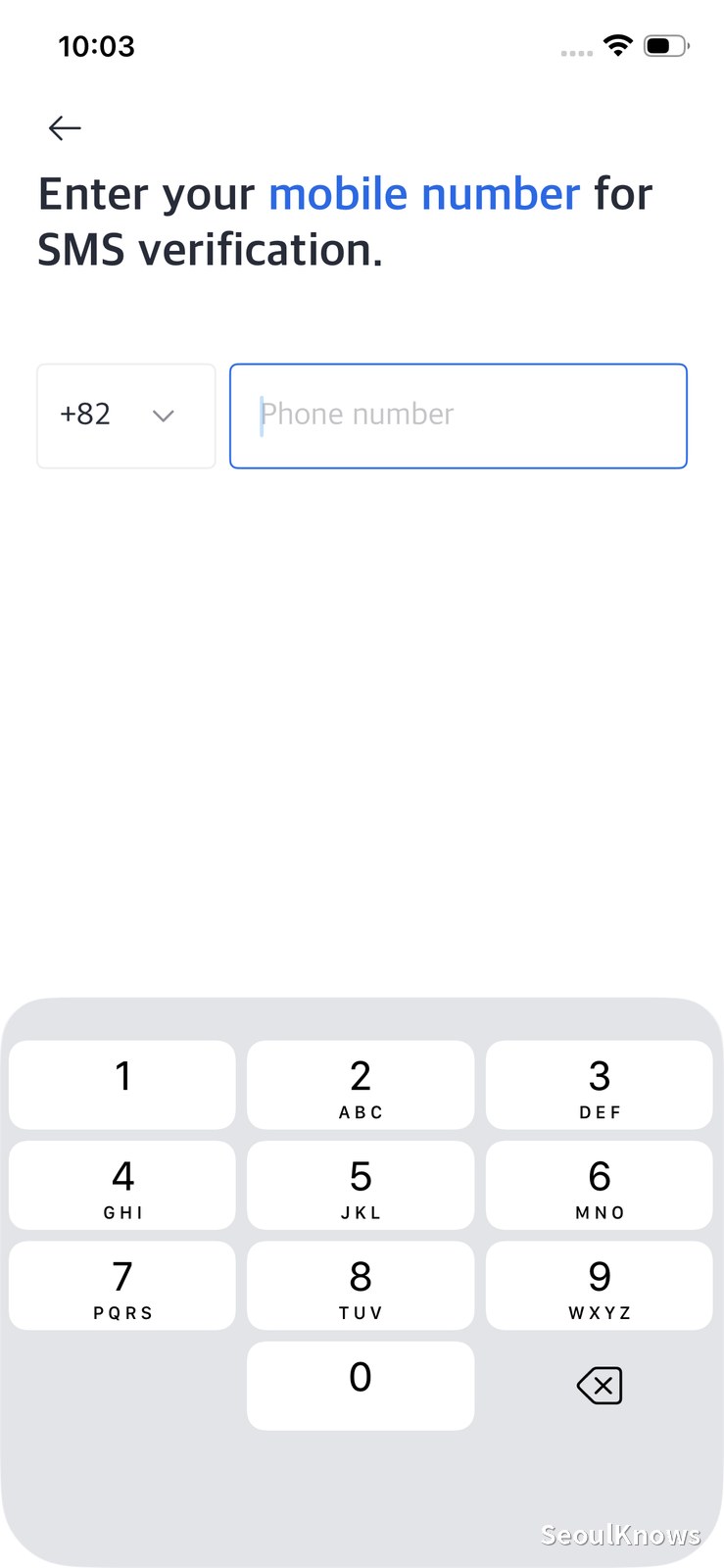 Kakao T foreigner signup screen in English showing an international country code selector for SMS verification