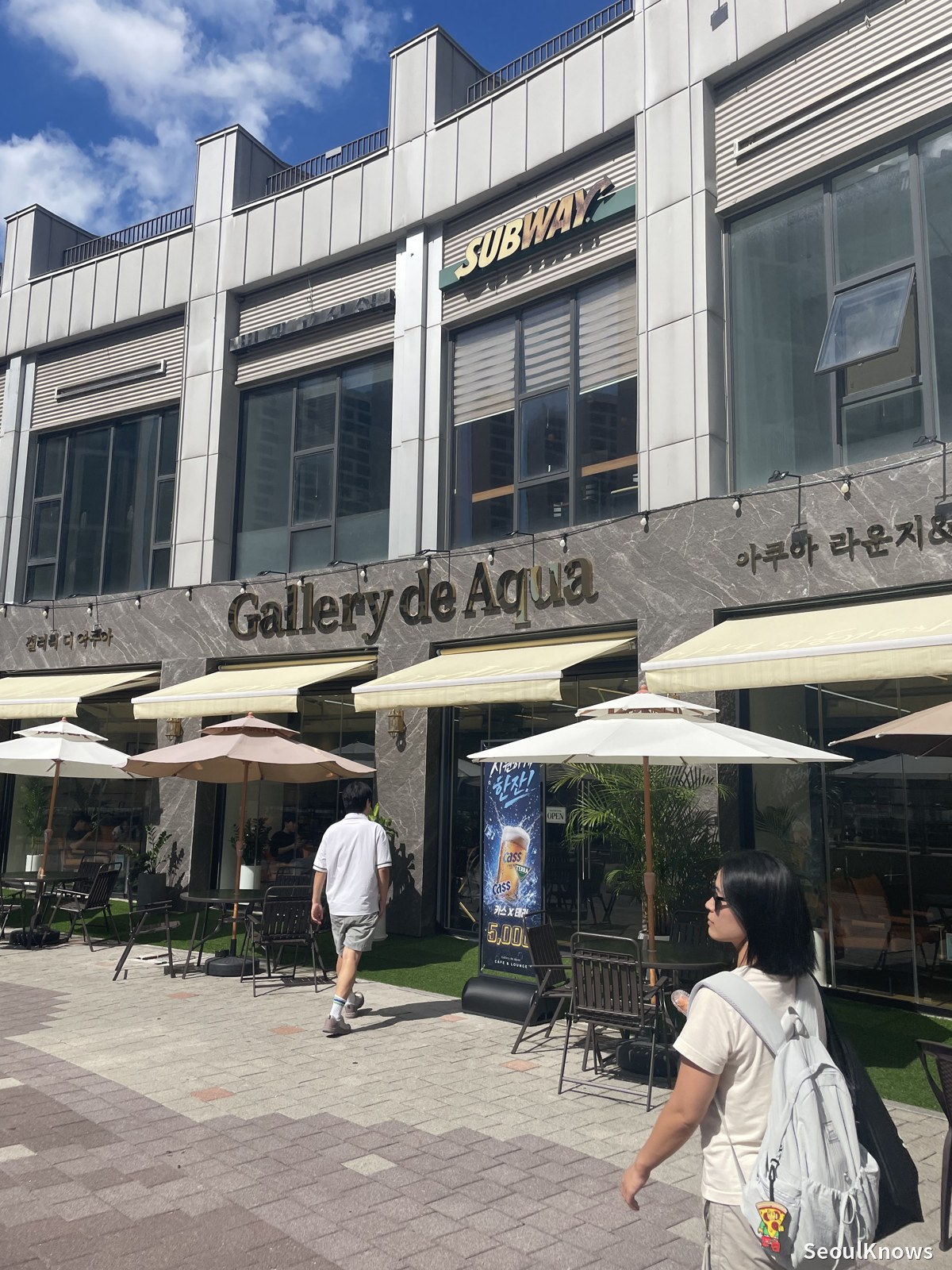 Gallery de Aqua café entrance sign in Laveniche