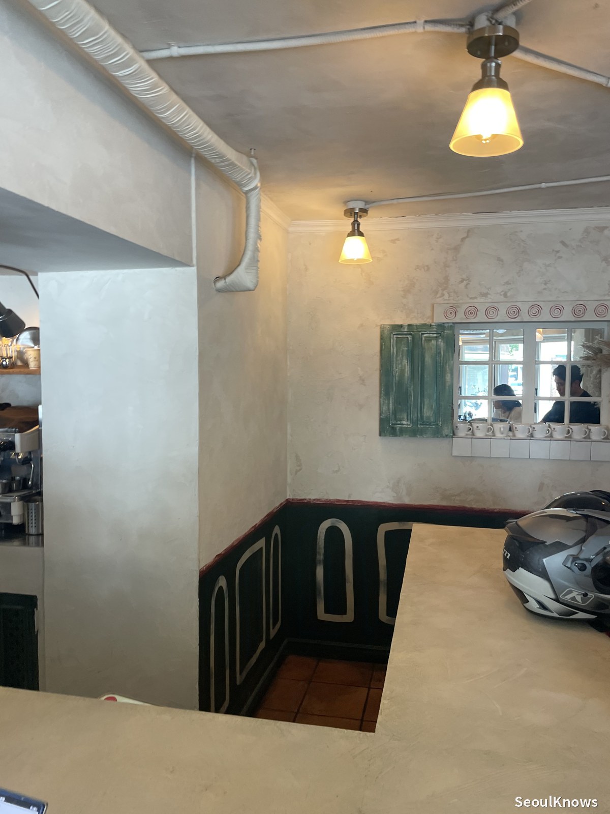 Cozy Spanish-style interior of Gluglu churros cafe