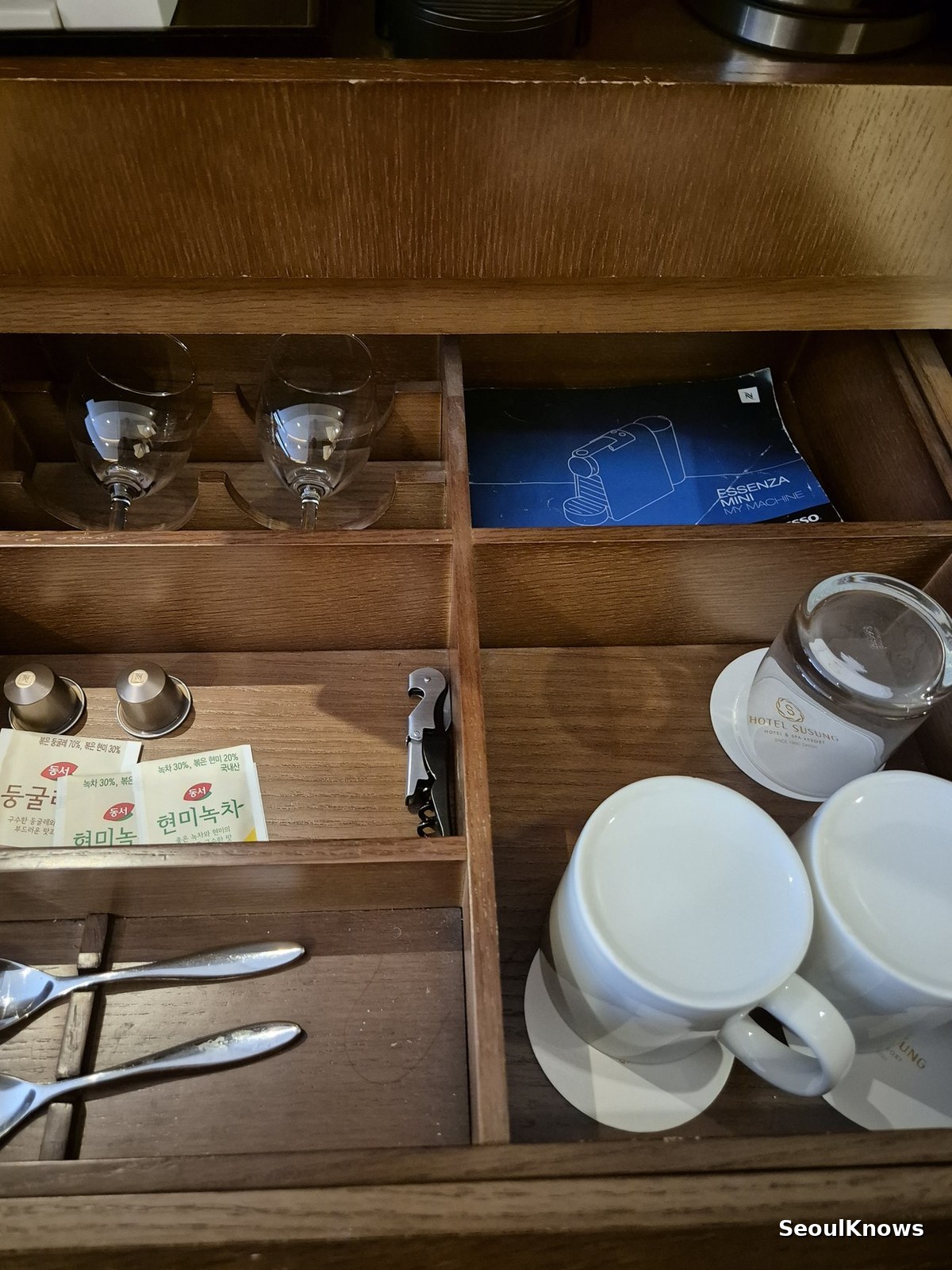 Cups and tea set stored in a drawer in a Hotel Susung guest room