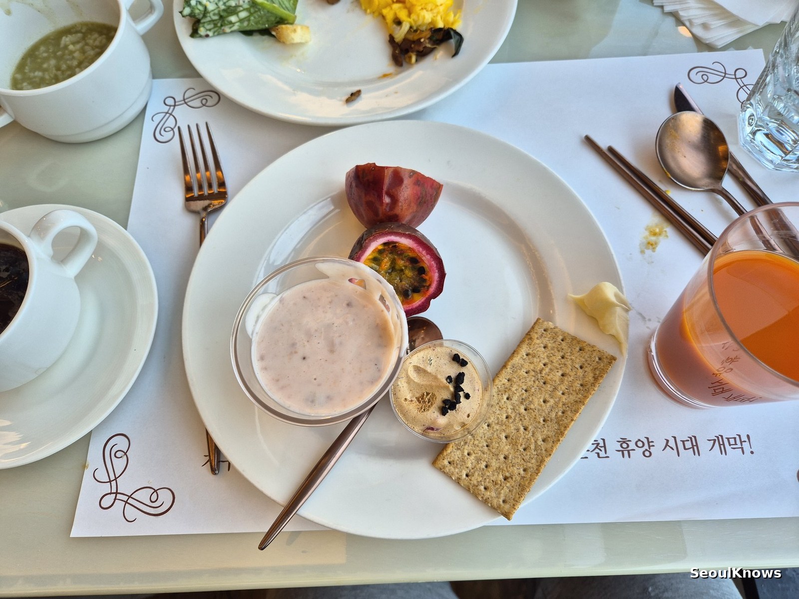 Breakfast plate with crackers yoghurt and fruit at Hotel Susung Four Seasons