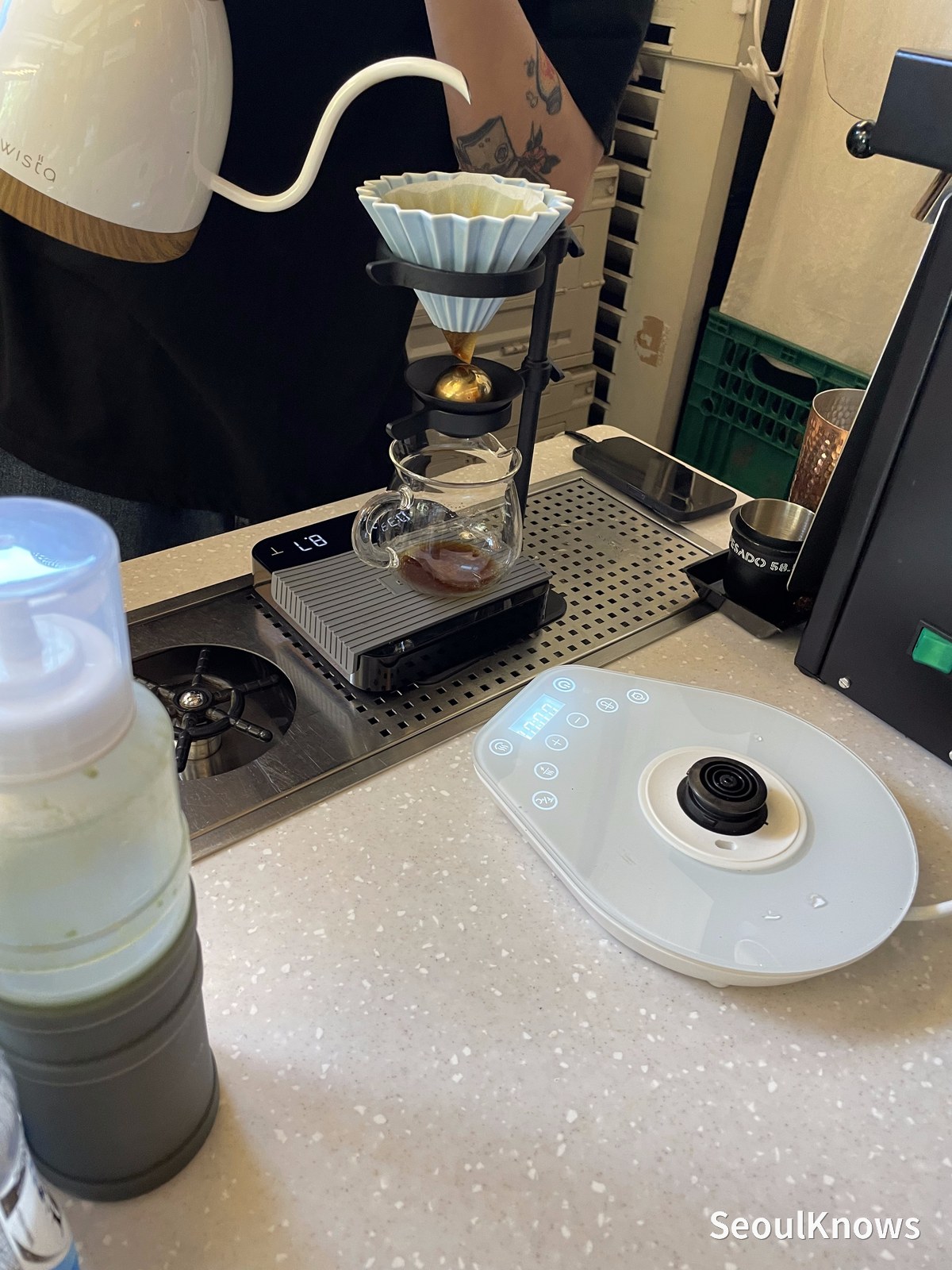 Pour-over coffee being brewed to order at Jakjak Coffee Stand