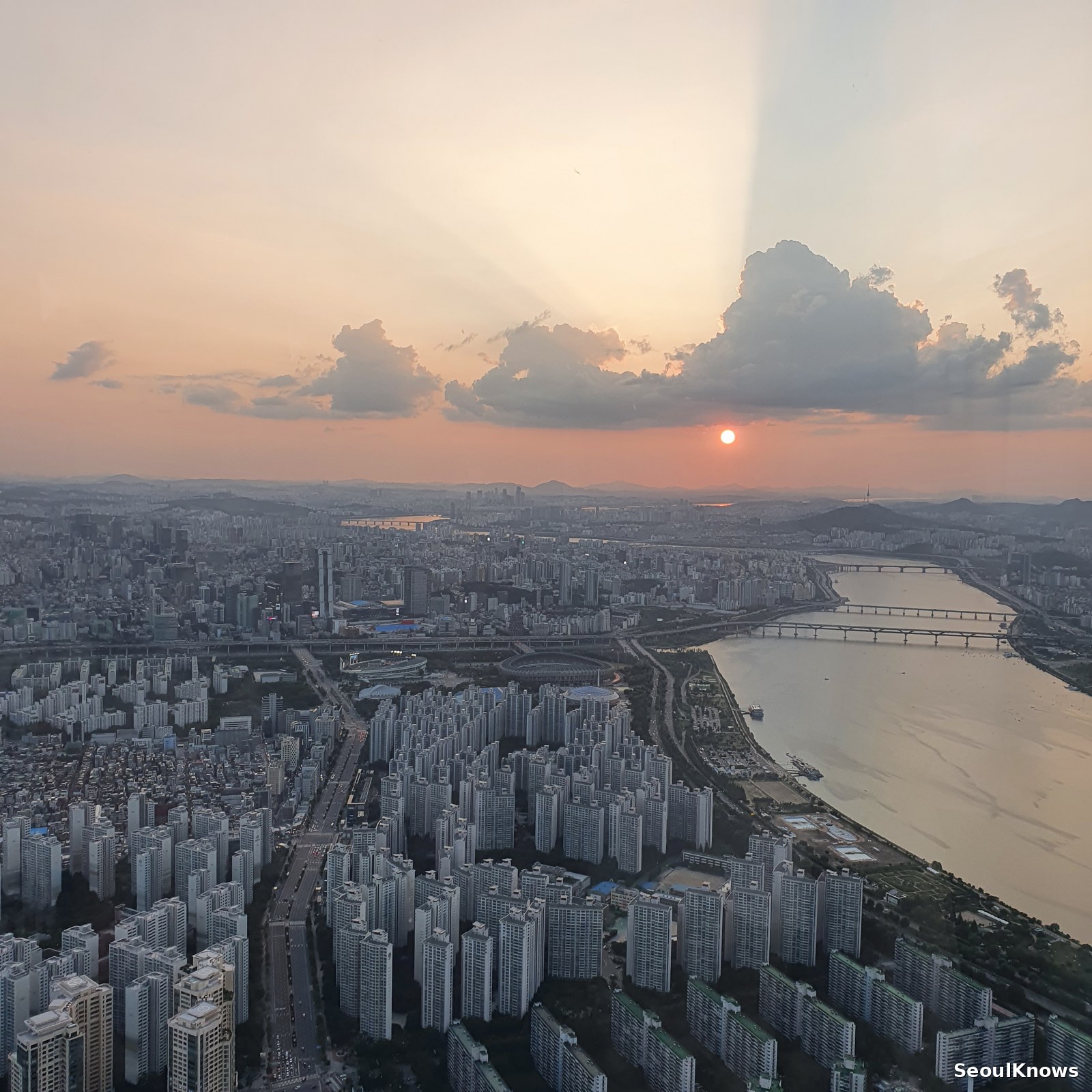 The sun setting behind the Han River seen from 500 metres up