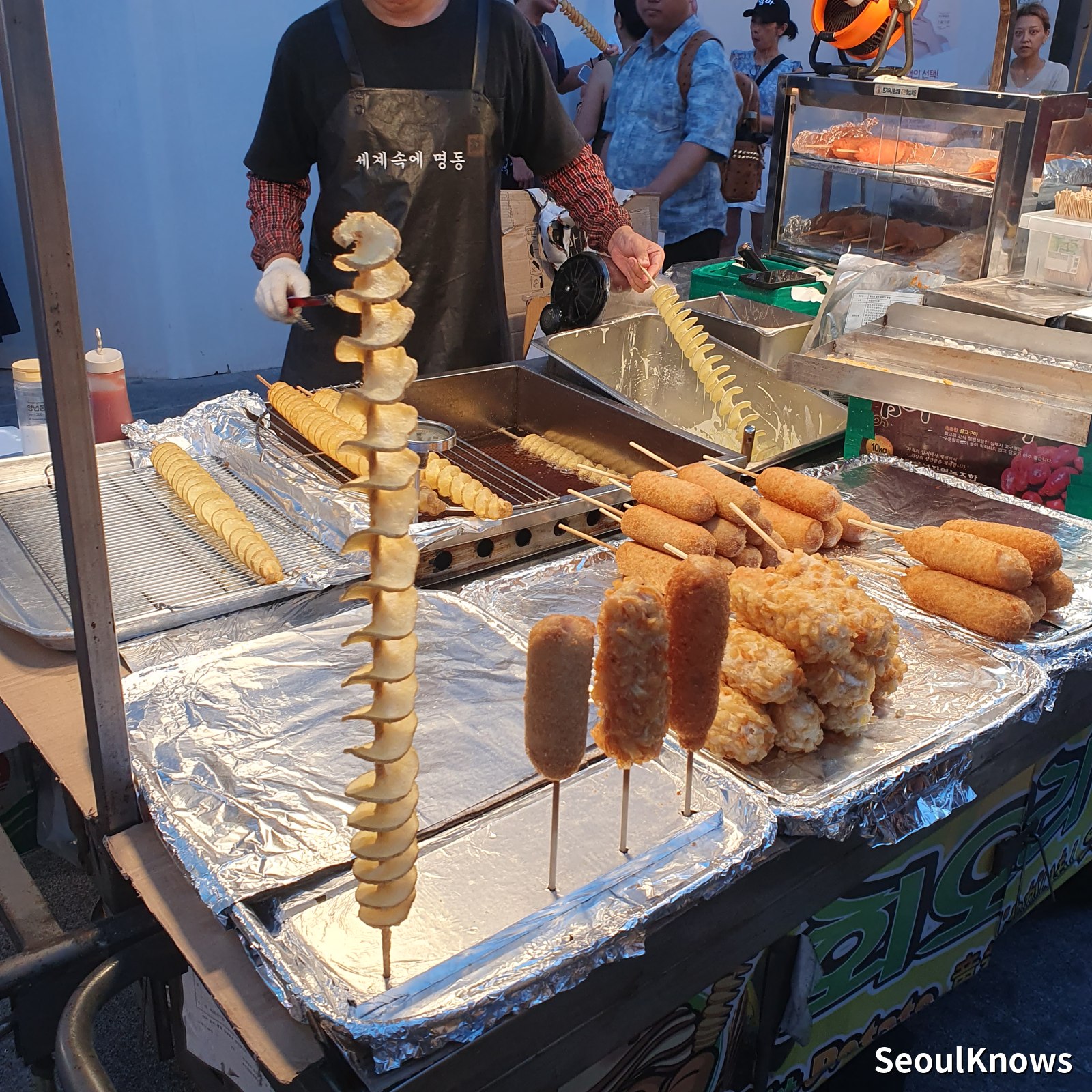 Tornado potato and sausage skewers deep fried