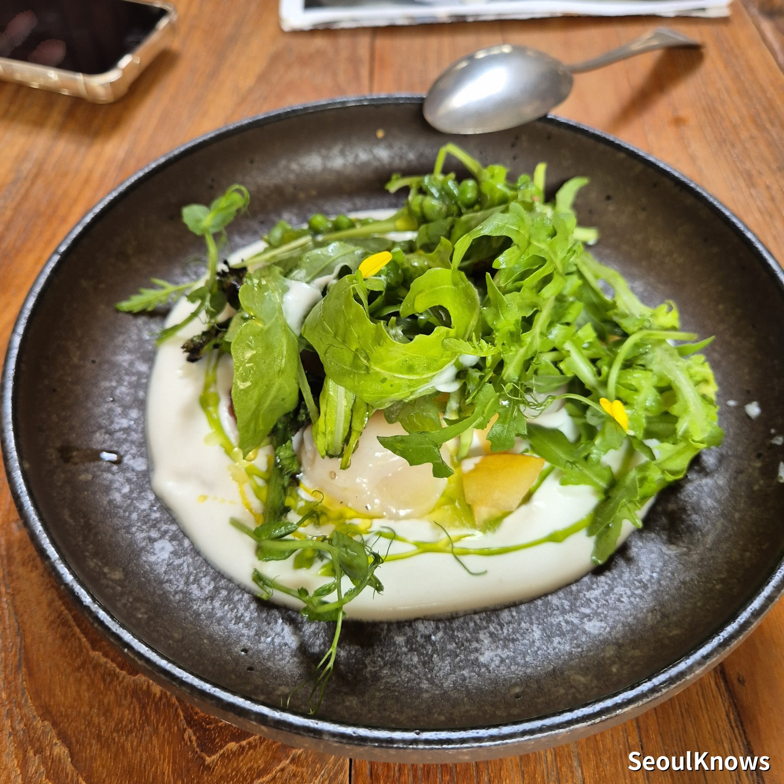 Poached egg with cream and rocket at Maison Leblanc