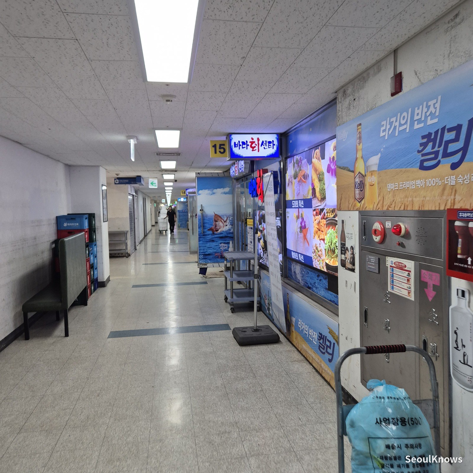 Restaurant signs along the corridor