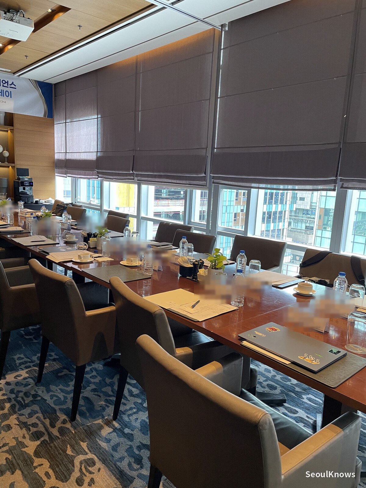 Private function room set up boardroom style at Courtyard by Marriott Seoul Pangyo, with window light and roll blinds