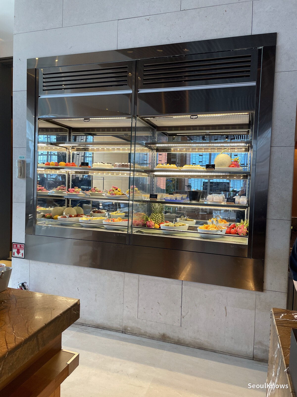 Refrigerated dessert showcase at the MoMo Cafe buffet