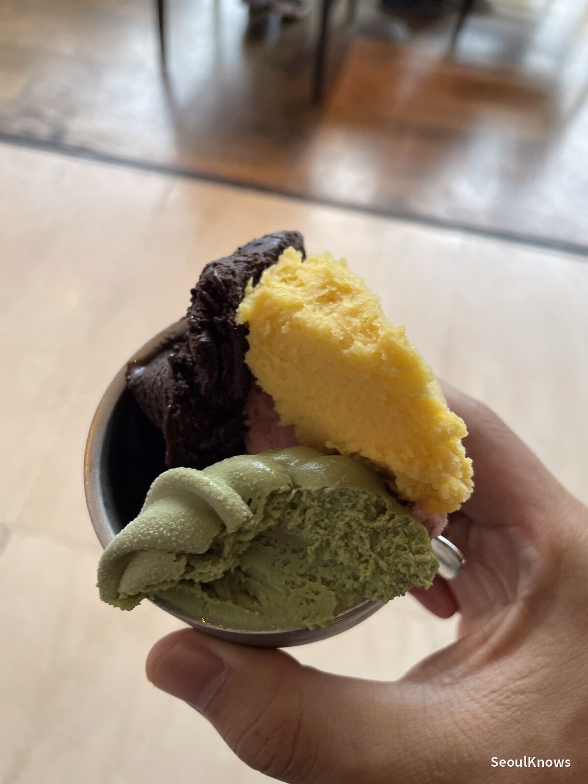 Gelato case with several flavours at MoMo Cafe