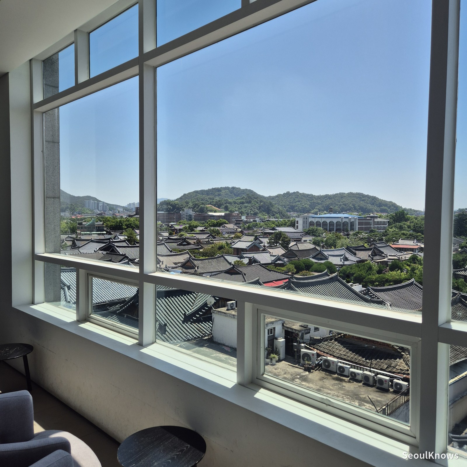 Daytime hanok village view from a window