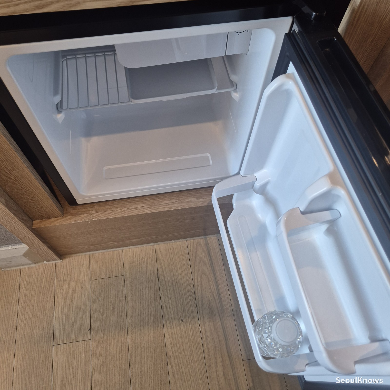 Bottled water in the room fridge