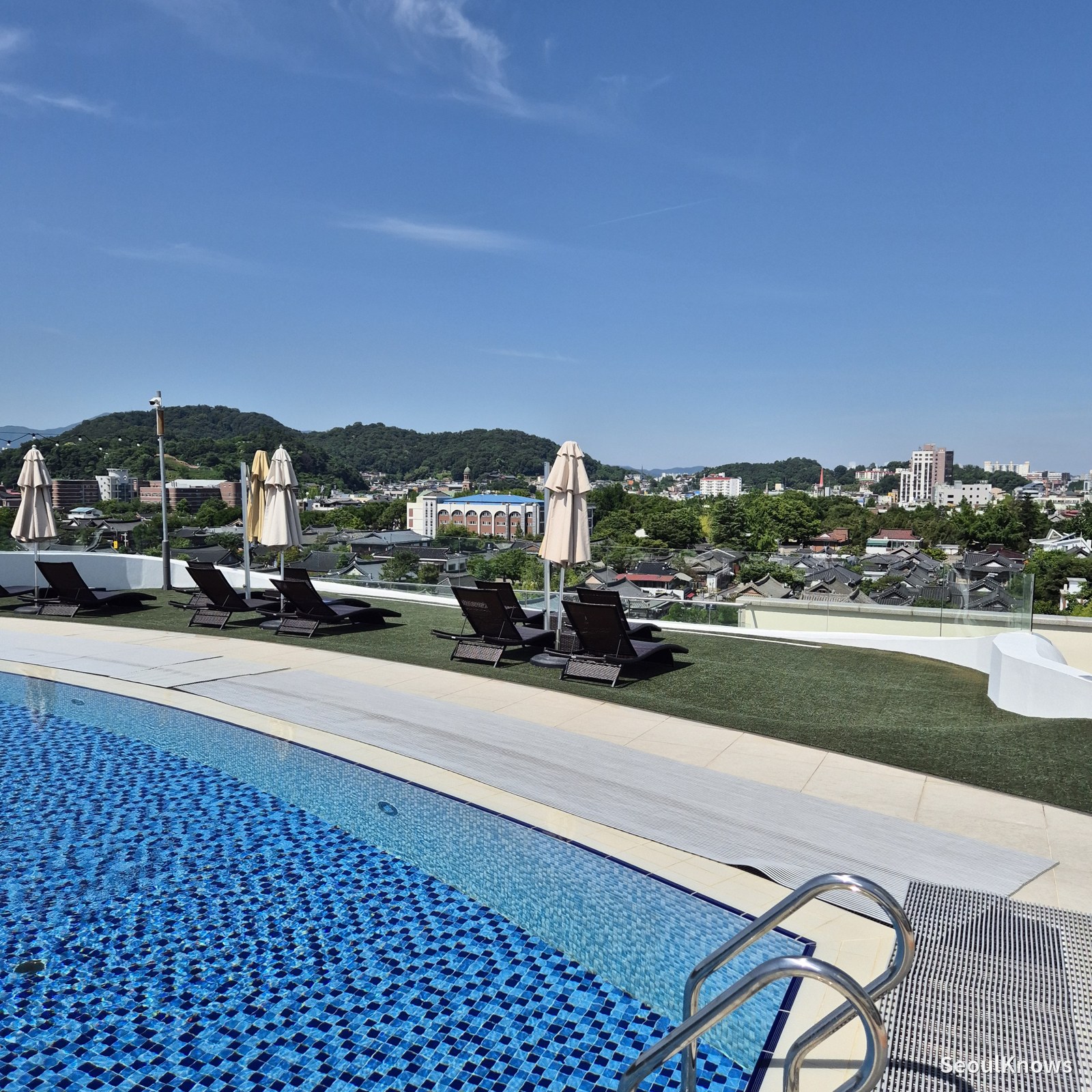Pool loungers and umbrellas