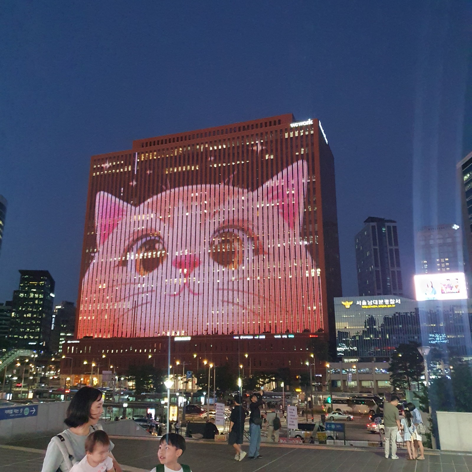 Seoul Square media canvas giant cat facade seen from Seoul Station