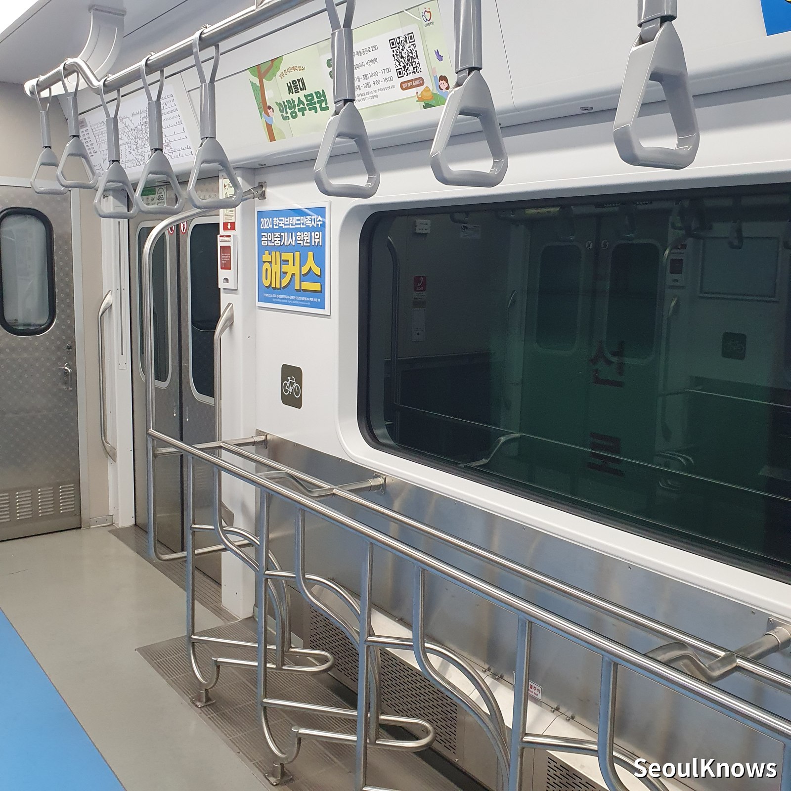 Bicycle storage rack inside a Seoul subway train car