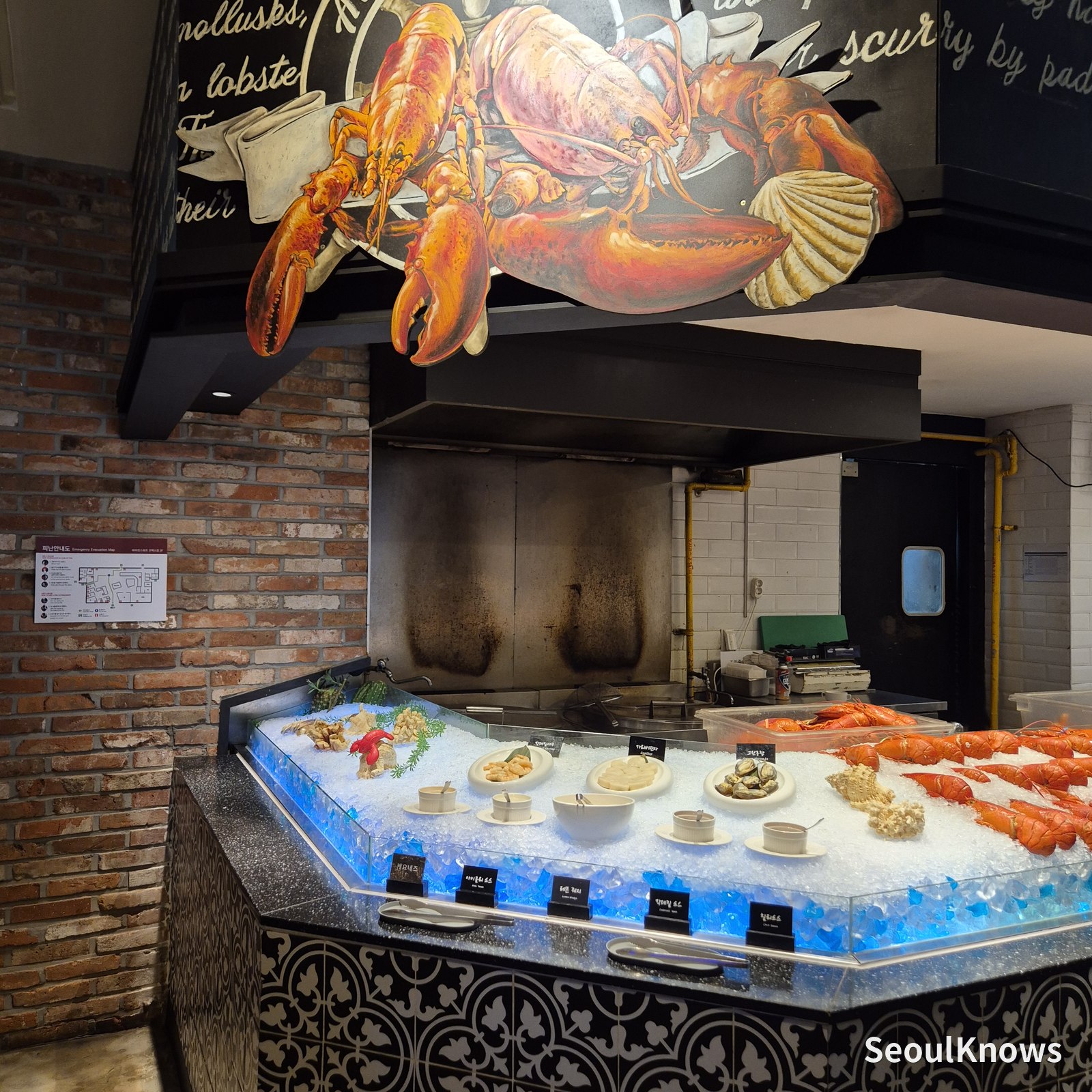 Lobster mural above the preparation counter at Viking's Wharf COEX