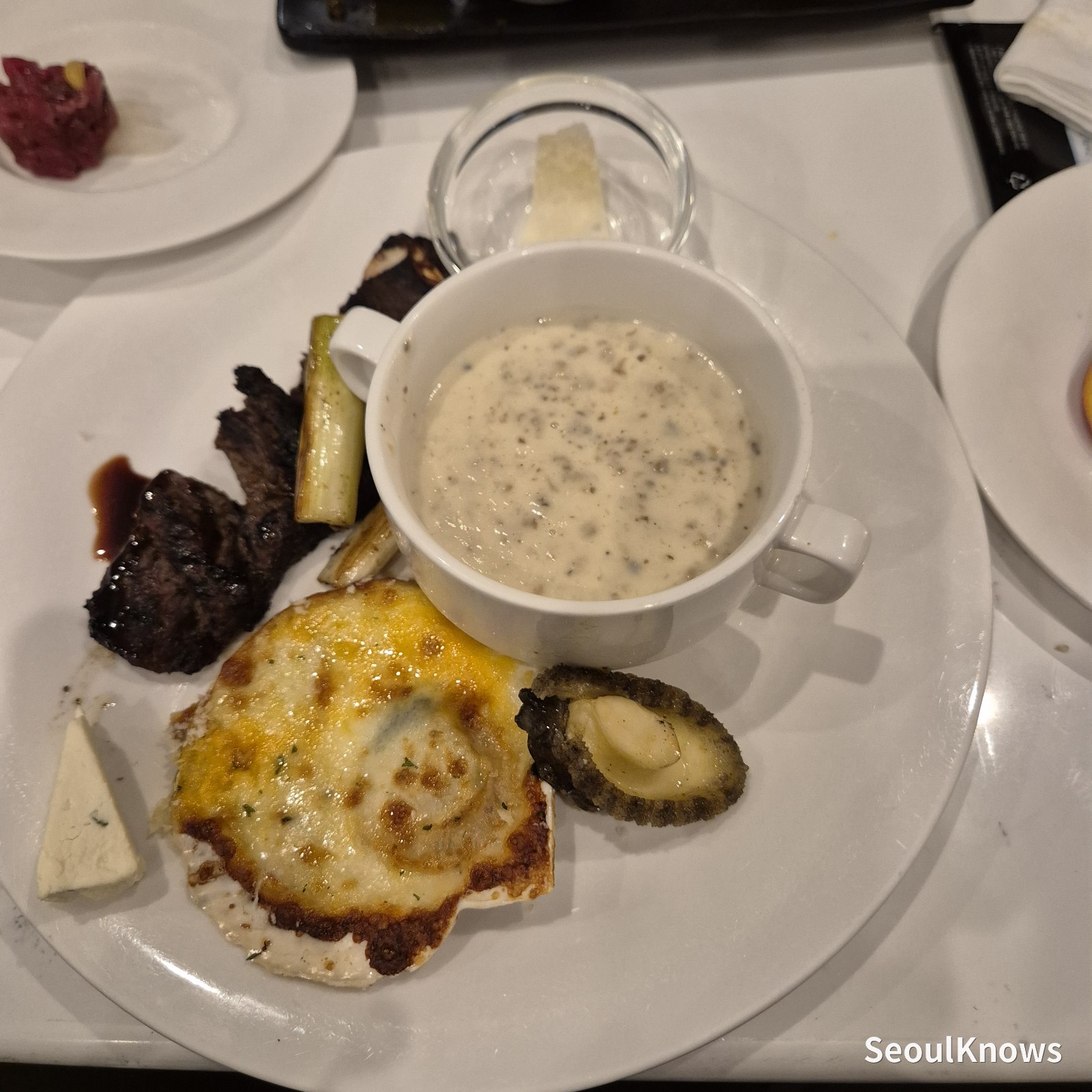 Plate of soup and grilled dishes at Viking's Wharf COEX