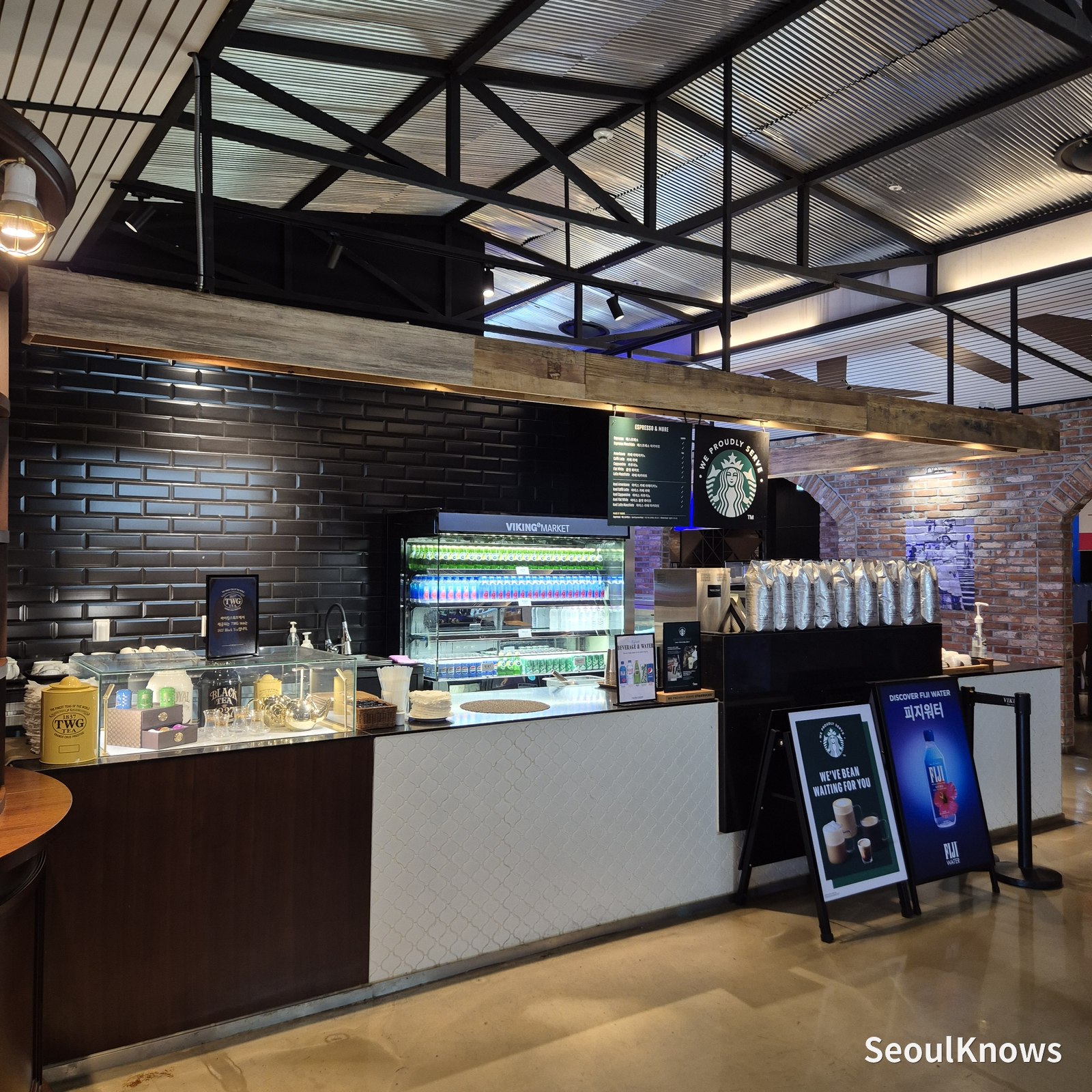 Drinks counter at Viking's Wharf COEX with Starbucks coffee, TWG tea and FIJI water